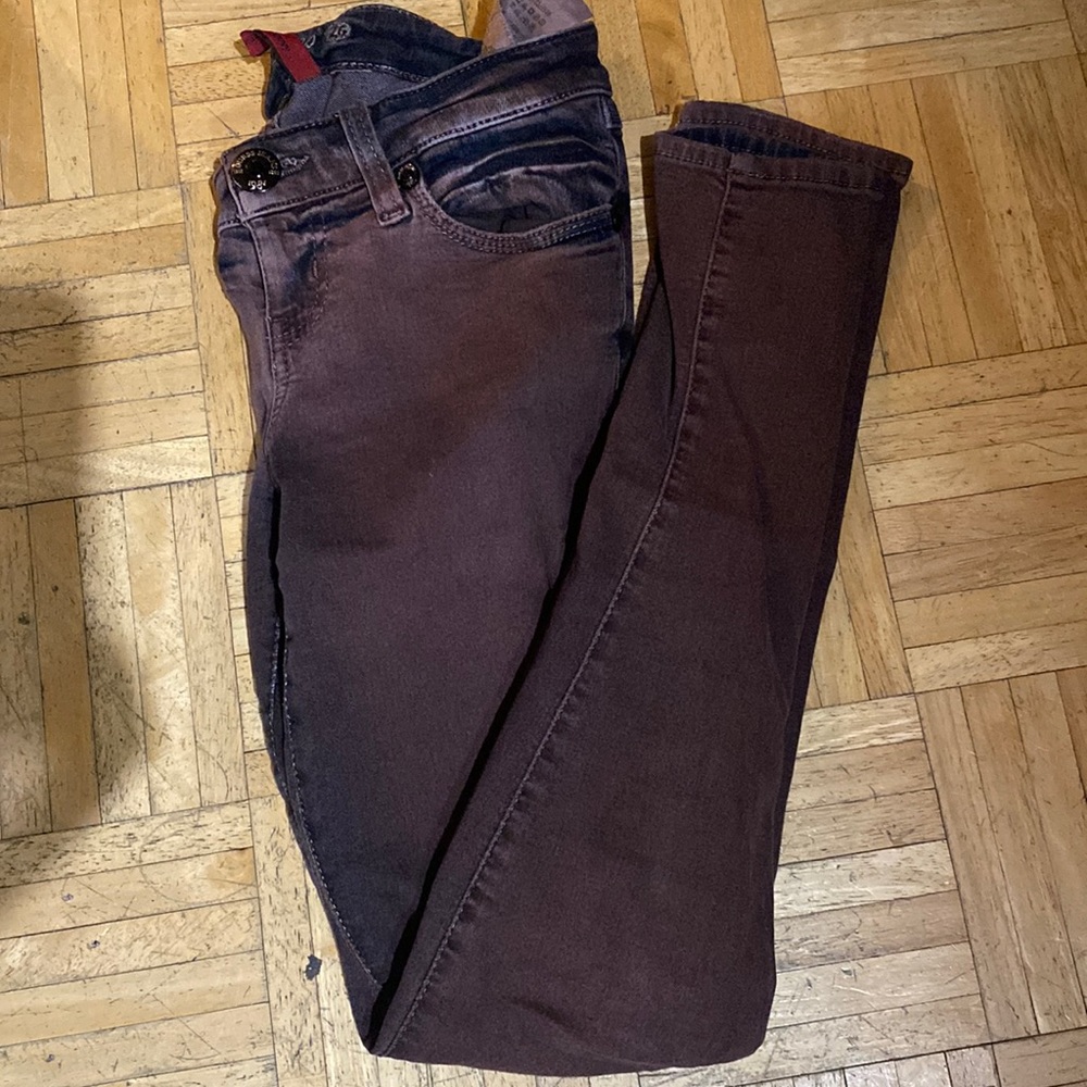 Burgundy skinny Guess jeans in a size 26.